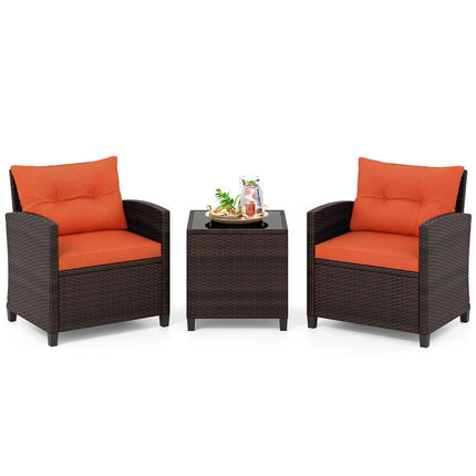 3-teiliges Rattan-Loungeset mit orangefarbenen Kissen