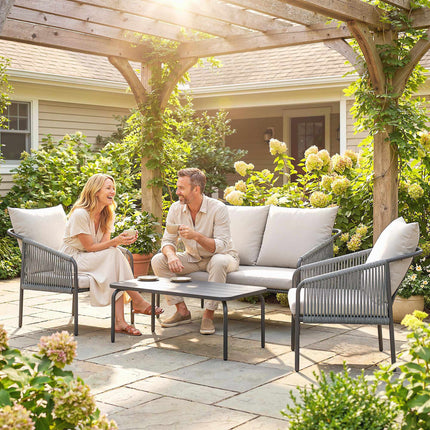 4-Piece Rattan Lounge Set with Cushions and Table