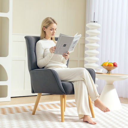 Gray velvet armchair with wooden legs for living room