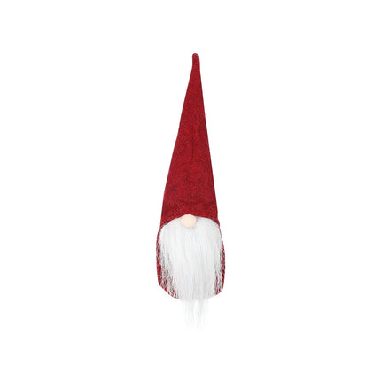 Un gnome rouge debout 