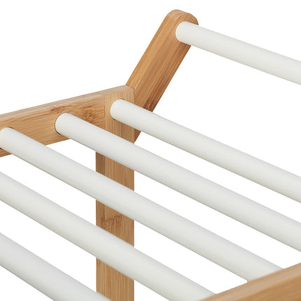 Bathroom shelf with towel holder
