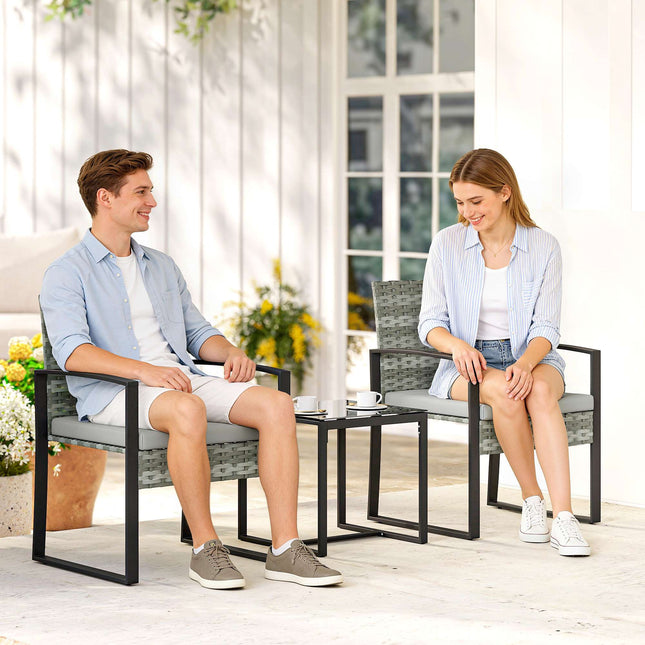 Bistro-Set mit Kissen, PE-Rattan, Glasplatte