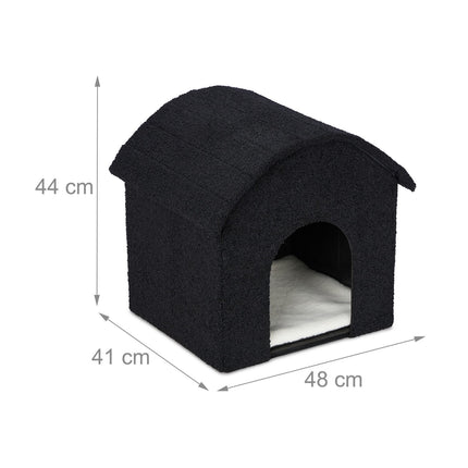Black cat hide with scratching surface