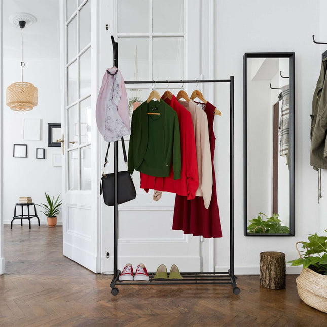 Black coat hanger with wheels