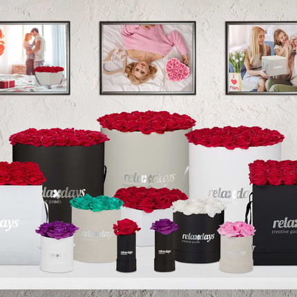 Black heart-shaped rose box with 18 roses