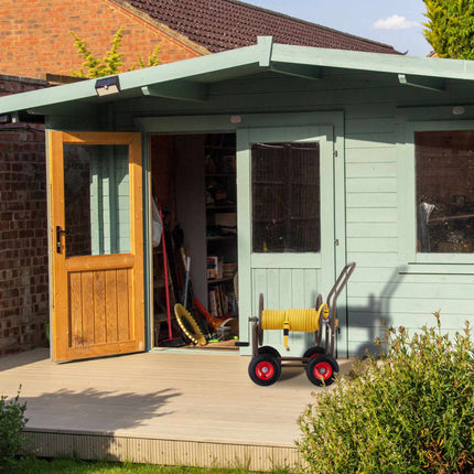 Brown hose cart with 4 wheels