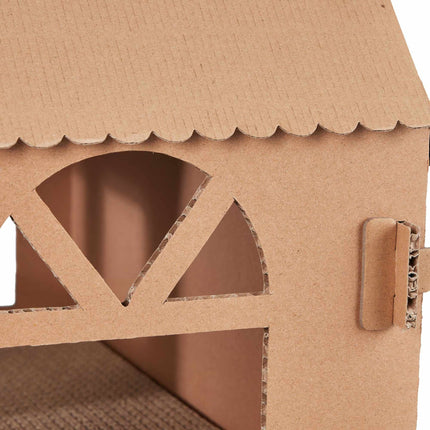 Cardboard cat house with scratching board