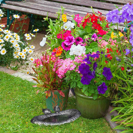 Cast iron bird bath with birds