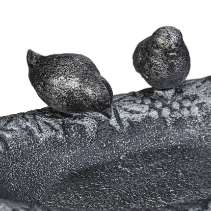 Cast iron bird bath with birds