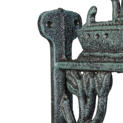 Sonnette en fonte avec motif de bateau