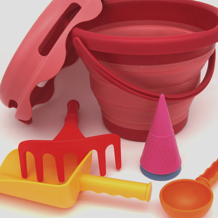 Compactoys plážový kbelík s hračkami na písek 7 v 1, červený