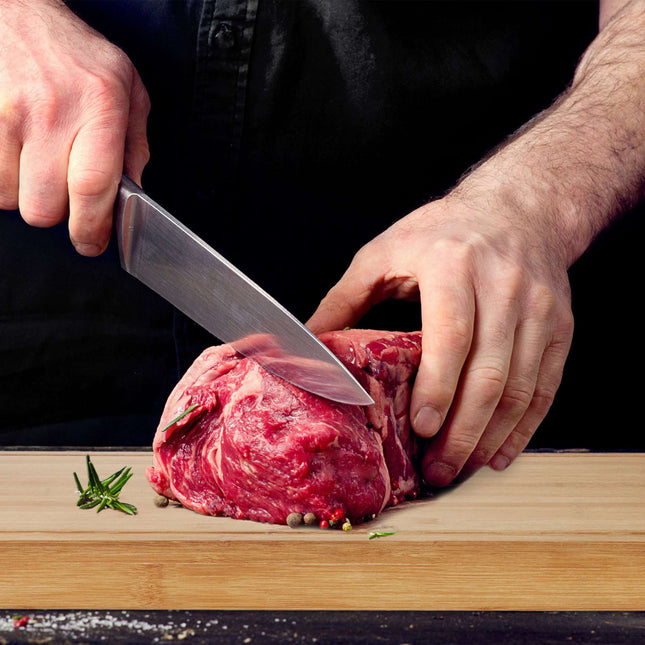 Cutting board with bent edge