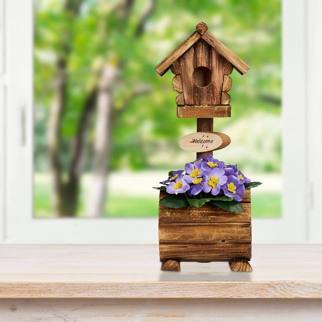 Dekoratives Vogelhaus mit Blumentopf