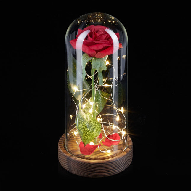 Ewige Rose im Glas mit Kerze