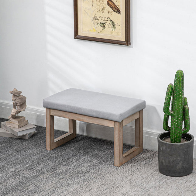 Grauer Fußhocker in Leinenoptik mit Holzfüßen - 68x38x42 cm