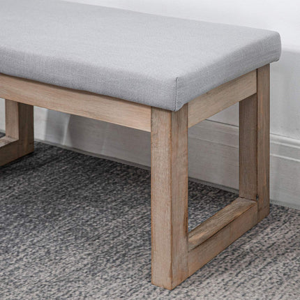 Grauer Fußhocker in Leinenoptik mit Holzfüßen - 68x38x42 cm