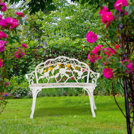 Garden bench white-bronze colored with roses