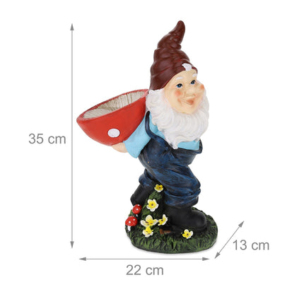 Garden gnome with bird bath