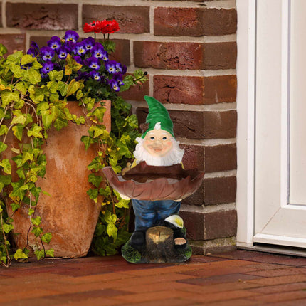 Garden gnome with bird bath