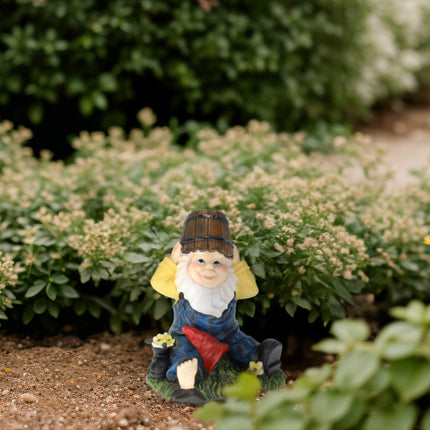 Garden gnome with water bucket