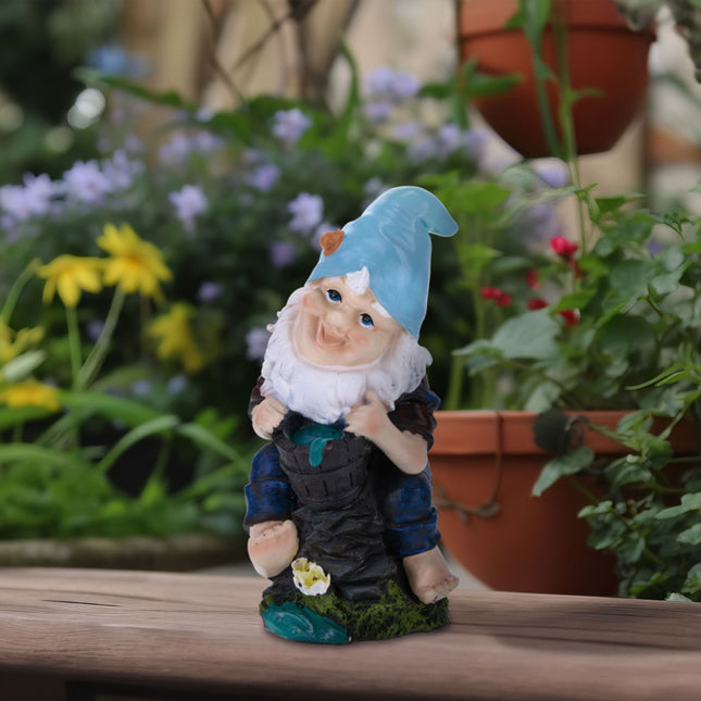 Garden gnome with water bucket