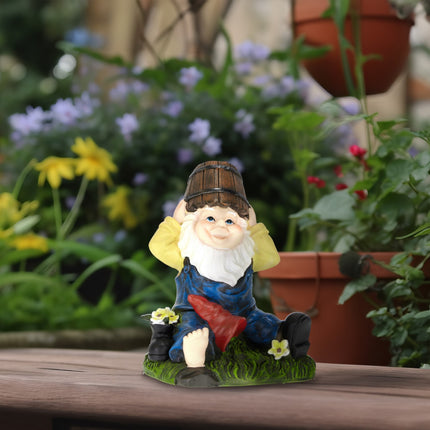 Garden gnome with water bucket