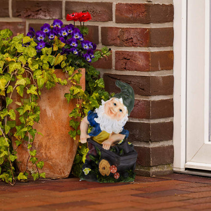 Garden gnome with wheelbarrow