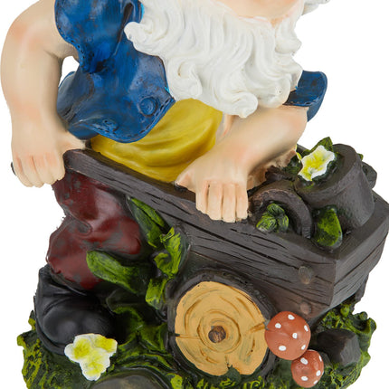 Garden gnome with wheelbarrow