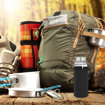Glass drinking bottle with lid