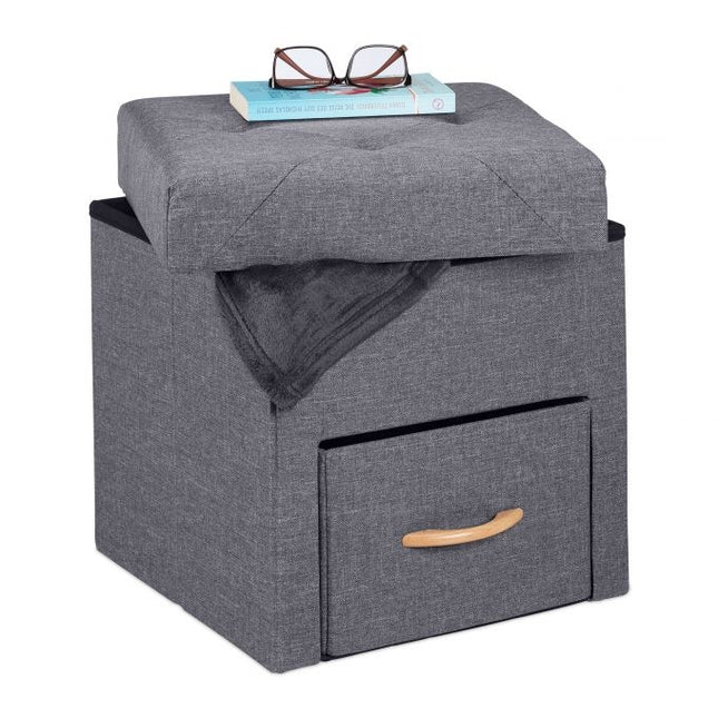 Grauer Hocker mit Stauraum