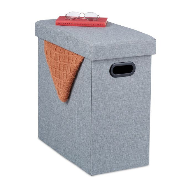 Grauer Hocker mit Stauraum