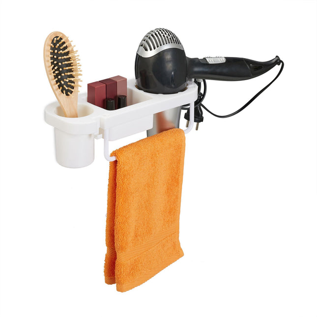 Hair dryer holder for the wall