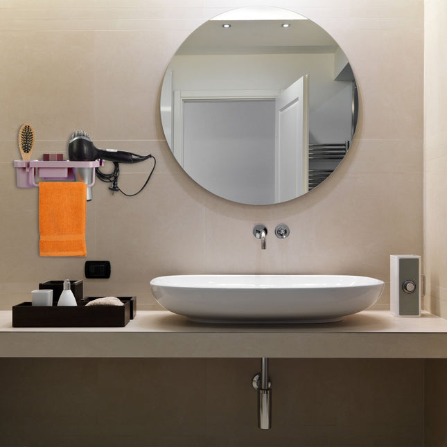 Hair dryer holder for the wall