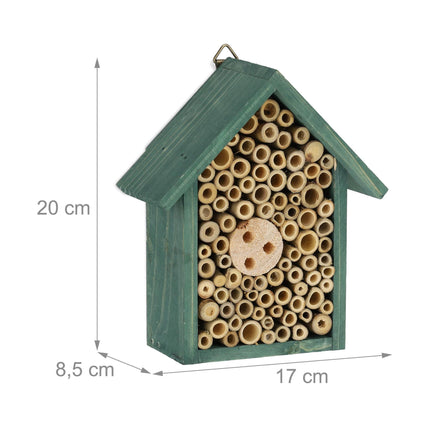 Insect hotel for wild bees in green