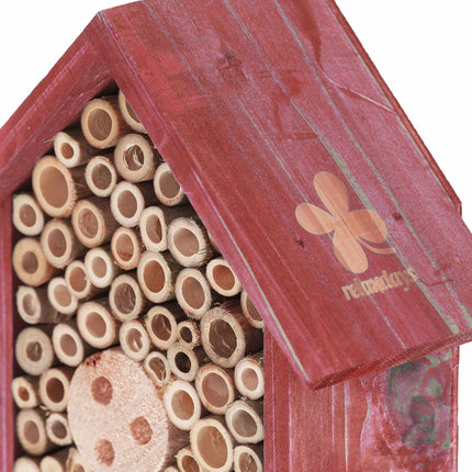 Insect hotel for wild bees in red