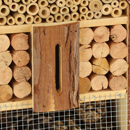 Insect hotel in the form of a house
