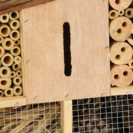 Insect hotel with bark roof