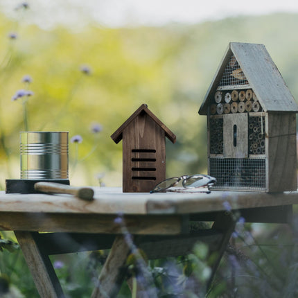 Ladybug house in brown wood