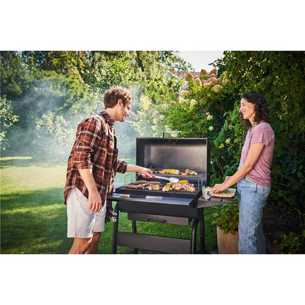 Großer Holzkohlegrill mit verstellbarem Rost und Thermometer