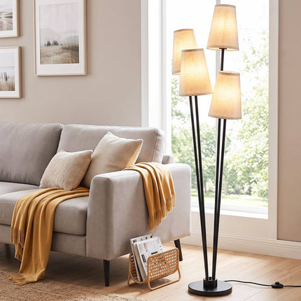 Moderne vloerlamp met 4 lampen, stoffen kappen en voetschakelaar.