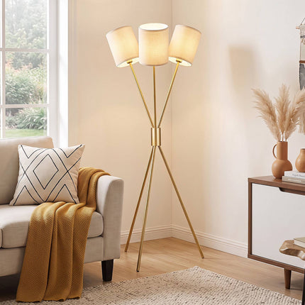 Moderne gouden driepoot vloerlamp met stoffen kappen