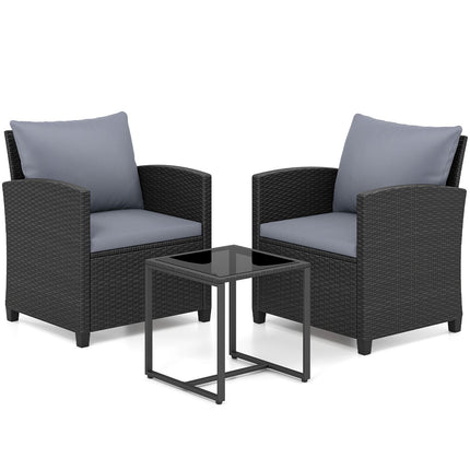 Tuinset van rotan met kussens en glazen tafel