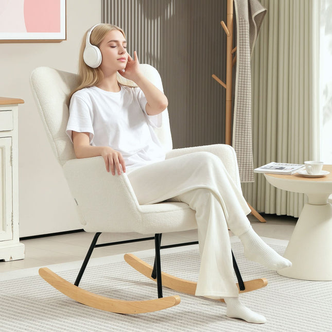 White padded rocking chair with armrests, wooden base