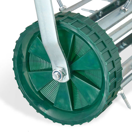 Rolling lawn aerator with handle