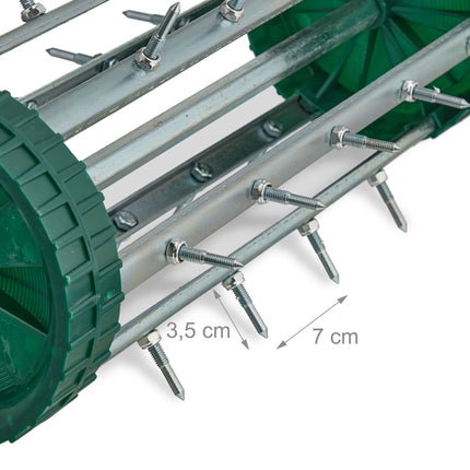 Rolling lawn aerator with handle