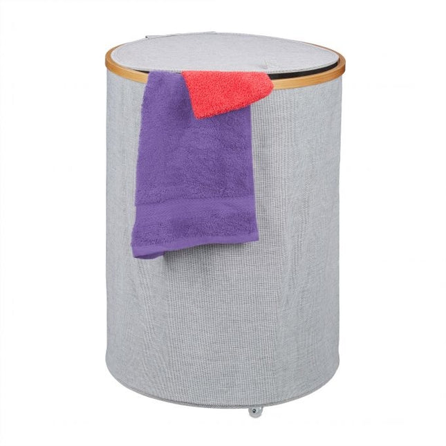 Runder Wäschekorb aus Stoff und Bambus