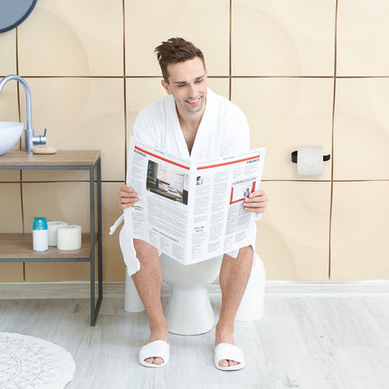 Self-adhesive toilet paper holder