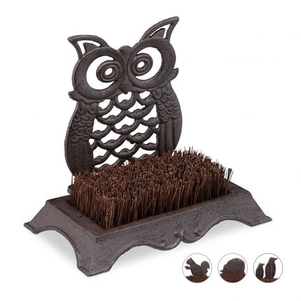 Shoe brush in cast iron with animal motifs