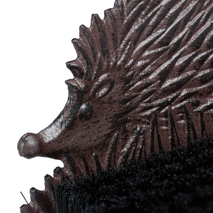 Shoe brush in cast iron with animal motifs