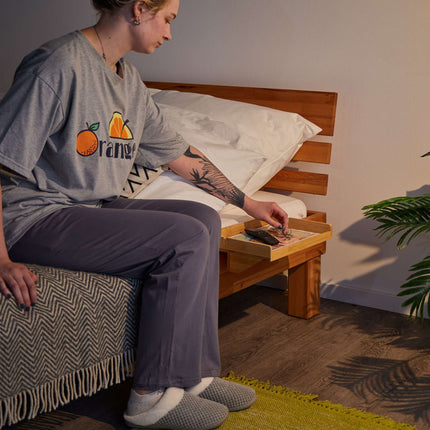 Squeezable bamboo bed tray